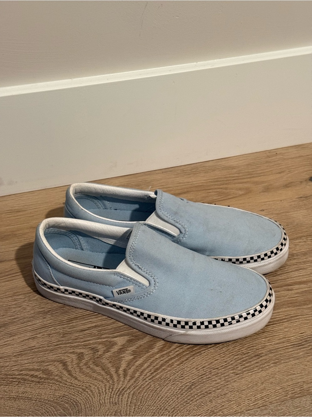 Vans Kids Slip-On Sneakers in Light Blue with Checkerboard Trim
